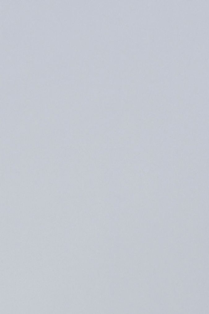 Colombian singer Karol G poses for photographs as she arrives at the Jacquemus Menswear Spring-Summer 2024 show as part of the Paris Fashion Week, at the Chateau de Versailles, in Versailles, southwest of Paris, on June 26, 2023. (Photo by JULIEN DE ROSA / AFP) (Photo by JULIEN DE ROSA/AFP via Getty Images)