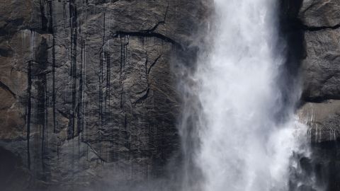 YOSEMITE NATIONAL PARK, CALIFORNIA - APRIL 28: Torrents of water cascade down Upper Yosemite Fall in Yosemite Valley, as warming temperatures have increased snowpack runoff, on April 28, 2023 in Yosemite National Park, California. Most of Yosemite Valley will close this evening until May 3rd because of forecasted flooding from melting snowpack and extended high temperatures. Yosemite Falls is fed almost completely by snowmelt with hydrologists estimating that 2,400 gallons per second of water can flow over the falls at peak flow. As of April 1, snowpack in the Tuolumne River basin of Yosemite National Park was 244% of average amid record snowpack levels for some parts of California after years of drought. (Photo by Mario Tama/Getty Images)