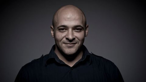 DUBAI, UNITED ARAB EMIRATES - DECEMBER 13: (EDITORS NOTE: This image has been desaturated) Actor Mike Batayeh during a portrait session on day five of the 9th Annual Dubai International Film Festival held at the Madinat Jumeriah Complex on December 13, 2012 in Dubai, United Arab Emirates. (Photo by Gareth Cattermole/Getty Images for DIFF)