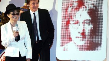 LAS VEGAS - JUNE 26: (L-R) Yoko Ono and Sir Paul McCartney stand next to a plaque of John Lennon during a dedication ceremony for the plaque and one for George Harrison as part of the first anniversary celebration of "The Beatles LOVE by Cirque du Soleil" show at The Mirage Hotel & Casino June 26, 2007 in Las Vegas, Nevada. (Photo by Ethan Miller/Getty Images)