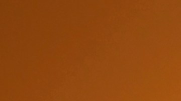 People step into their vehicles as the sun sets over Los Angeles, California on September 30, 2020. - A heat advisory is in effect through Friday in the Southern California region where temperatures are expected to climb into triple-digits, according to the National Weather Service. (Photo by Frederic J. BROWN / AFP) (Photo by FREDERIC J. BROWN/AFP via Getty Images)