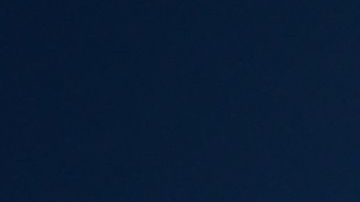 A child sips water from a bottle under a scorching sun on August 30, 2022 in Los Angeles, California. - Forecasters said the mercury could reach as high as 112 Fahrenheit (44 Celsius) in the densely populated Los Angeles suburbs in the next week as a heat dome settles in over parts of California, Nevada and Arizona. (Photo by Frederic J. BROWN / AFP) (Photo by FREDERIC J. BROWN/AFP via Getty Images)