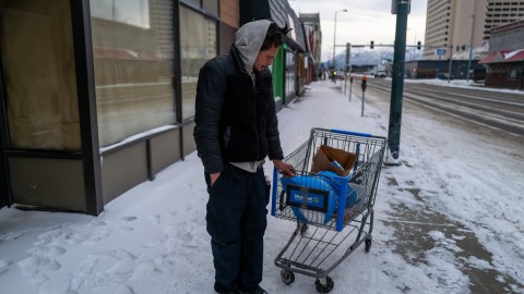 ANCHORAGE, ALASKA - NOVEMBER 07: A man pauses on a street downtown where homelessness is a chronic problem, on November 07, 2022 in Anchorage, Alaska. In one of the more closely watched contests in the state, incumbent Rep. Mary Peltola (D-AK), the first Native Alaskan to be elected to the House of Representatives, is running against three candidates, including former Gov. Sarah Palin for the state's at-large Congressional district in tomorrow's general election. (Photo by Spencer Platt/Getty Images)