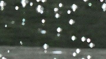 A child tosses water from a cup while playing in the water fountain at Grand Park in Los Angeles, California, on July 2, 2023. After months of unseasonable weather across Southern California, a heatwave has arrived in time for the July 4th holiday, bringing triple digit temperatures. (Photo by Frederic J. BROWN / AFP) (Photo by FREDERIC J. BROWN/AFP via Getty Images)