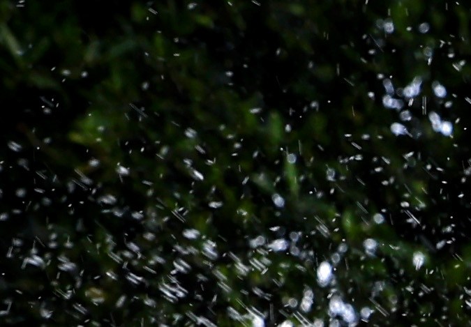 LOS ANGELES, CALIFORNIA - JULY 27: Los Angeles Department of Water and Power (LADWP) water conservation specialist Damon Ayala walks while inspecting a sprinkler system, which is operating in violation of the water conservation ordinance, on July 27, 2022 in Los Angeles, California. Amid California’s ongoing drought, Ayala and other public servants with the Water Conservation Response Unit patrol the city for lawn watering violations and respond to water waste reports from members of the community. Following increased lawn watering restrictions due to the drought, Angelenos recorded the lowest all-time water use for any June recorded in the City of Los Angeles. (Photo by Mario Tama/Getty Images)