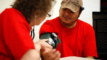 LOS ANGELES, CA - JULY 10: Pablo Suares has his blood pressure checked as nurses and physicians give free basic health screenings and call attention to what they say is the ongoing healthcare emergency despite the decision of the U.S. Supreme Court to uphold the Affordable Care Act, on July 10, 2012 in Los Angeles, California. Three days of free screenings in the Los Angeles area are part of the Medicare for All tour which is making up to two dozen stops across California between June 19 and July 12. The California Nurses Association says that 30 percent of Los Angeles County adults are uninsured and 18 percent cannot afford doctor visits. (Photo by David McNew/Getty Images)