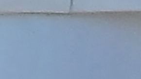 Un hombre se retrata junto a un termómetro que muestra 102 F en Baker, California, el 11 de julio de 2023.