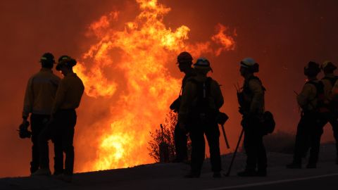 Firefighters monitor and set a controled burn as the Rabbit Fire scorched over 7,500 acres in Moreno Valley, Riverside County, California on July 15, 2023. Brutally high temperatures threatened tens of millions of Americans July 15, as numerous cities braced to break records under a relentless heat dome that has baked parts of the country all week. The National Weather Service warned of an "extremely hot and dangerous weekend," with daytime highs reaching up to 116 Fahrenheit (47 degres celsius). (Photo by DAVID SWANSON / AFP) (Photo by DAVID SWANSON/AFP via Getty Images)