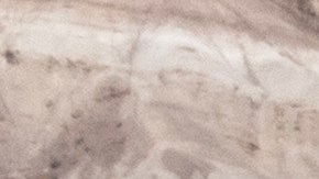 FURNACE CREEK, CALIFORNIA - JULY 16: U.S. Park Ranger Eric Henson (R) pretends to be cold while posing next to the unofficial thermometer at the Furnace Creek Visitor Center indicating a temperature of 132 degrees Fahrenheit, which is known for showing temperatures that are inaccurately higher than the official temperature, on a day that could set a new world heat record in Death Valley National Park on July 16, 2023 near Furnace Creek, California. Weather forecasts for tomorrow call for a high temperature of 129 degrees F and possibly as high as 131. Previously, the highest temperature reliably recorded on Earth was 129.2 F (54C) in Death Valley in 2013. A century earlier, a high temperature in Death Valley reportedly reached 134 F but many modern weather experts have rejected that claim along with other high summer temperatures reported in the region that year. (Photo by David McNew/Getty Images)