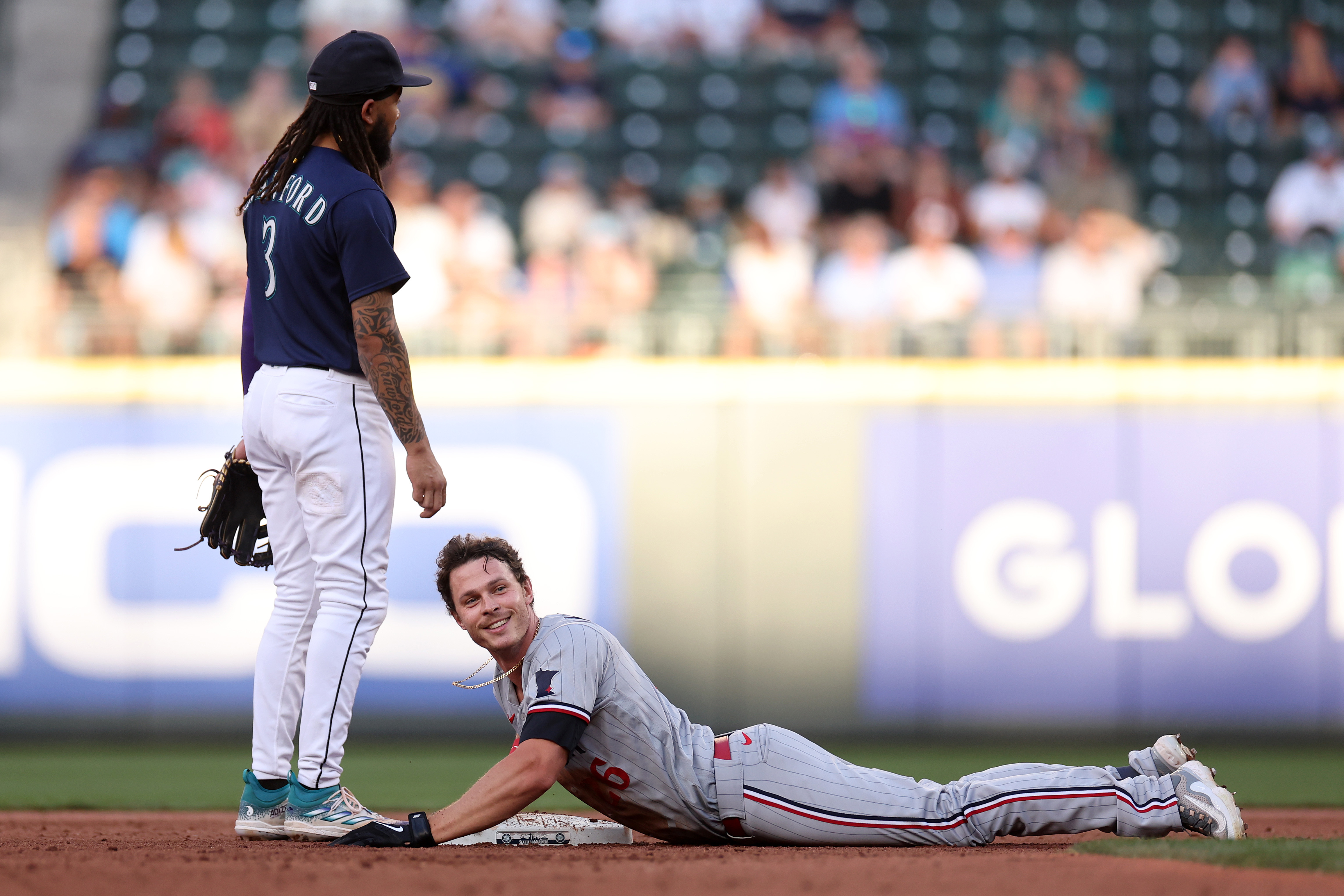 Max Kepler of the Minnesota Twins reacts to his brace against the Seattle Mariners during the fourth inning at T-Mobile Park on July 17, 2023 in Seattle, Washington.  Photo: Steph Chambers//Getty Images. 
