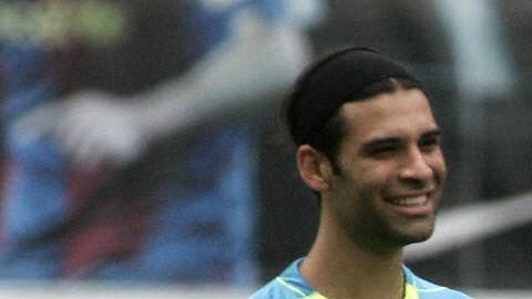 Diego Milito, Rafa Márquez y Messi en un entrenamiento del FC Barcelona. CESAR RANGEL - Getty Images.