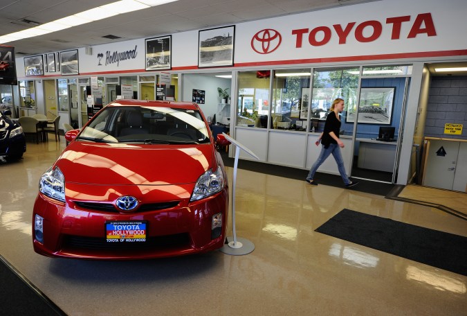 LOS ANGELES, CA - FEBRUARY 08: A customer walks in the showroom of Hollywood Toyota dealership on February 8, 2011 in Los Angeles, California. Toyota Motor Corp. profits dropped almost 40 percent in its third fiscal quarter as the carmaker waits for the US government's official investigation into reports of unintended acceleration in thousands of Toyotas, with fatal consequences in some cases that forced the company to hold massive recalls. (Photo by Kevork Djansezian/Getty Images)
