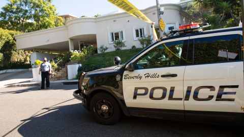 A Yellow Police tape blocks access to the 1100 block of Maytor place where Jacqueline Avant's house is at the top of the hill, in Beverly Hills , California on December 1, 2021. - The wife of the man known as the "Godfather of Black Music" was shot and killed Wednesday in a break-in at the couple's Beverly Hills home, US media reported. Jacqueline Avant died after being shot by a burglar, who also opened fire on a security guard, according to tabloid website TMZ. (Photo by VALERIE MACON / AFP) (Photo by VALERIE MACON/AFP via Getty Images)