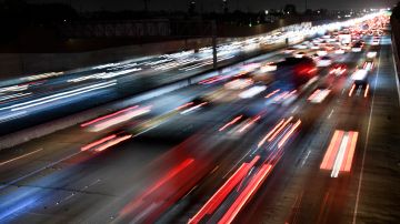In a long exposure image, cars, trucks, and sport utility vehicles (SUVs) drive on the 405 Freeway during rush hour traffic as oil and gasoline fuel prices experienced an increase on March 10, 2022 in Los Angeles, California. - US consumer prices hit a new 40-year high last month as the world's largest economy continued to be battered by a surge of inflation, which the fallout from Russia's invasion of Ukraine is expected (Photo by Patrick T. FALLON / AFP) (Photo by PATRICK T. FALLON/AFP via Getty Images)