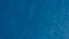 A woman checks off the numbers chosen for her Mega Millions lottery tickets at a 7-Eleven convenience store in Chino Hills, California on July 28, 2022. - The odds of claiming this week's bonanza US lottery prize are less than one-in-300-million -- but one "lucky" convenience store outside Los Angeles is already counting its winnings. A sign above the counter of the otherwise unassuming shop in California's Chino Hills proclaims itself the "LUCKIEST 7-ELEVEN IN THE WORLD," six years after it sold a winning ticket for the largest jackpot in US lottery history. (Photo by RINGO CHIU / AFP) (Photo by RINGO CHIU/AFP via Getty Images)