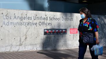 A pedestrian walks past the headquarters of the Los Angeles Unified School District on October 3, 2022 in Los Angeles, California. - LAUSD Superintendant ALberto Carvalho remains firm on Monday on his refusal to pay a ransom demanded by an international hacking syndicate, days after hacked data from the school district was posted on the dark web. A hacking syndicate known as Vice Society sent a ransom demand to the school district last week setting an October 3 deadline to pay the unspecified ransom with threats to release more hacked data online if payment is not met. (Photo by Frederic J. BROWN / AFP) (Photo by FREDERIC J. BROWN/AFP via Getty Images)