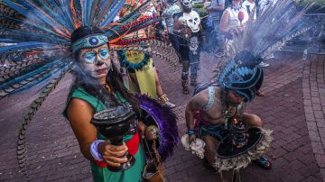 Aztec dancers perform their fire ceremony as they participate in the 13th Annual Florida Day of the Dead celebration in Fort Lauderdale, Florida on November 5, 2022. (Photo by Giorgio VIERA / AFP) (Photo by GIORGIO VIERA/AFP via Getty Images)