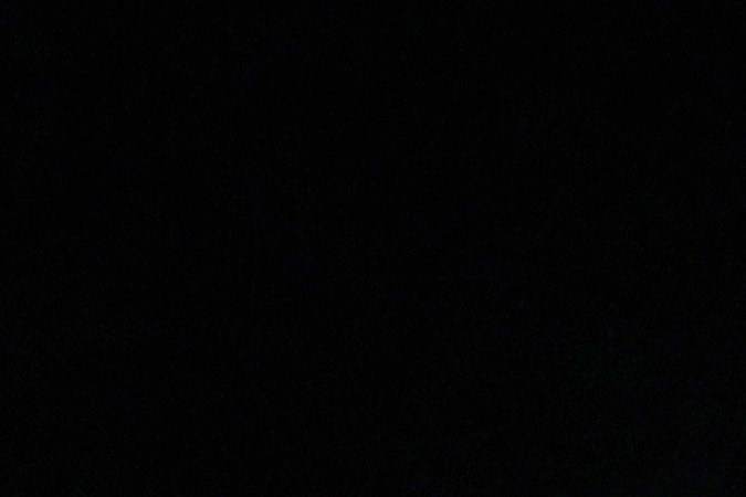 HALF MOON BAY, CALIFORNIA - JANUARY 23: A San Mateo County sheriff deputy pulls police tape across the entrance to a family reunification center following a mass shooting on January 23, 2023 in Half Moon Bay, California. Seven people were killed at two separate farm locations that were only a few miles apart in Half Moon Bay on Monday afternoon. The suspect, Chunli Zhao, was taken into custody a few hours later without incident. (Photo by Justin Sullivan/Getty Images)