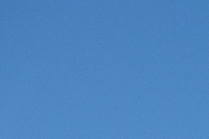 A peniche boat sails past the Eiffel Tower on the River Seine on July 17, 2023, during a parade to test "maneuvers", "distances", "duration" and "video capture" of the future opening ceremony of the Paris Olympics in 2024. For this mini-rehearsal, the total fleet is made up of 57 boats, 39 representing the delegations - slightly less than half as many as for the actual ceremony in 2024 - and 18 others providing support (assistance, first aid) as well as Olympic Broadcasting Services (OBS), the Olympic TV broadcaster. (Photo by BERTRAND GUAY / AFP) (Photo by BERTRAND GUAY/AFP via Getty Images)