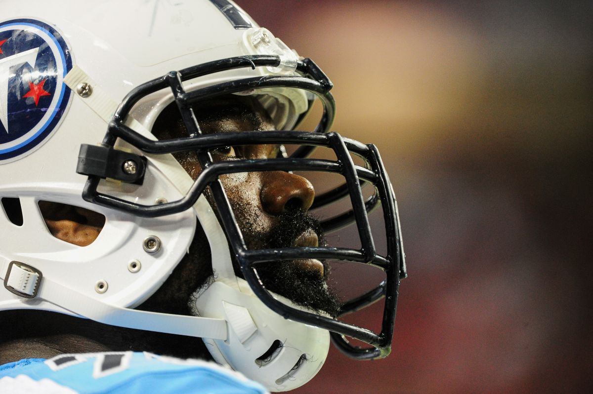  Michael Oher #72 of the Tennessee Titans is seen on the sidelines in the first half of a preseason game against the Atlanta Falcons at the Georgia Dome on August 23, 2014 in Atlanta, Georgia.  (Photo by Scott Cunningham/Getty Images)