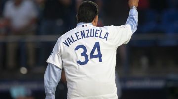 Mexican Fernando Valenzuela, ex-MLB Los Angeles Dodgers player, greets fans in the inaugural MLB game between Los Angeles Dodgers and San Diego Padres at Monterrey Stadium in Monterrey Nuevo Leon on May 4, 2018. (Photo by Julio Cesar AGUILAR / AFP) (Photo credit should read JULIO CESAR AGUILAR/AFP via Getty Images)