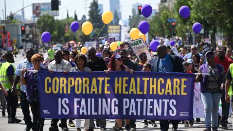Congresswoman Maxine Waters (2L) joins Kaiser Permanente healthcare workers, patients and their supporters in a Labor Day protest march, September 2, 2019 in Los Angeles, California. - The demonstrators were protesting what they call the healthcare giants unfair labor practices and shift from prioritizing patients to profits. More than 80,000 Kaiser Permanente workers nationwide are set to strike in early October if an agreement is not reached. (Photo by Robyn Beck / AFP) (Photo by ROBYN BECK/AFP via Getty Images)