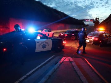 OAKLAND, CALIFORNIA - MAY 29: California Highway Patrol officers block a freeway entrance during a protest sparked by the death of George Floyd while in police custody on May 29, 2020 in Oakland, California. Earlier today, former Minneapolis police officer Derek Chauvin was taken into custody for Floyd's death. Chauvin has been accused of kneeling on Floyd's neck as he pleaded with him about not being able to breathe. Floyd was pronounced dead a short while later. Chauvin and 3 other officers, who were involved in the arrest, were fired from the police department after a video of the arrest was circulated. (Photo by Justin Sullivan/Getty Images)