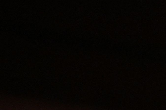 Los Angeles County District Attorney George Gascon removes his mask before speaking at a press conference, December 8, 2021 in Los Angeles, California. - Gascon was joined by a group of district attorneys from around the country at the press conference that was called for the accomplishments of his first year in office. (Photo by Robyn Beck / AFP) (Photo by ROBYN BECK/AFP via Getty Images)