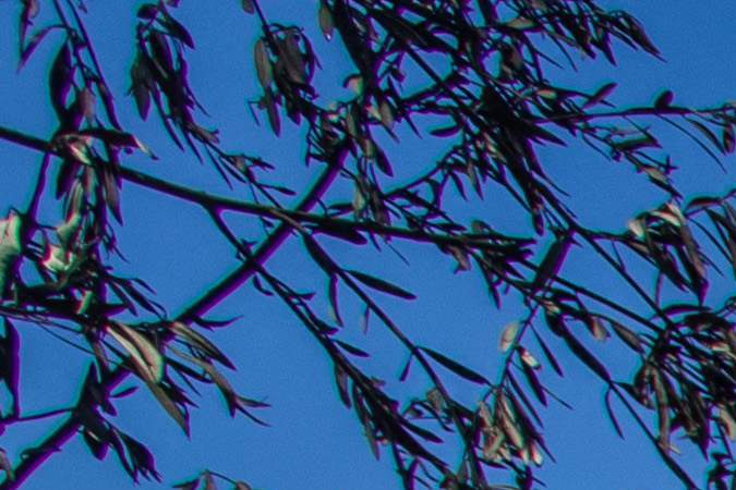 A burned Mercedes-Benz sits outside one of the homes destroyed by the Coastal Fire in Laguna Niguel, California, May 12, 2022. - A sudden and violent wildfire that tore through a luxury enclave in California destroying multi-million dollar homes in minutes was worsened by wind and the size of the properties, officials said. The blaze, which erupted on May 11, grew rapidly to engulf the community of Laguna Niguel, near Los Angeles. Around 1,000 homes were evacuated as the fire flared to 80 hectares (200 acres), destroying and damaging around 30 properties. (Photo by Apu GOMES / AFP) (Photo by APU GOMES/AFP via Getty Images)