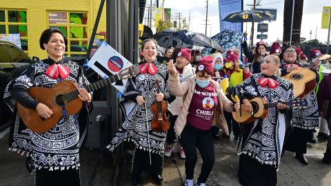 A Mariachi band leads a group of Latino and immigrant voters to a voting center at the Institute of Contemporary Art during the US midtermn elections in Los Angeles, California on November 8, 2022. (Photo by Frederic J. BROWN / AFP) (Photo by FREDERIC J. BROWN/AFP via Getty Images)