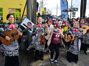A Mariachi band leads a group of Latino and immigrant voters to a voting center at the Institute of Contemporary Art during the US midtermn elections in Los Angeles, California on November 8, 2022. (Photo by Frederic J. BROWN / AFP) (Photo by FREDERIC J. BROWN/AFP via Getty Images)