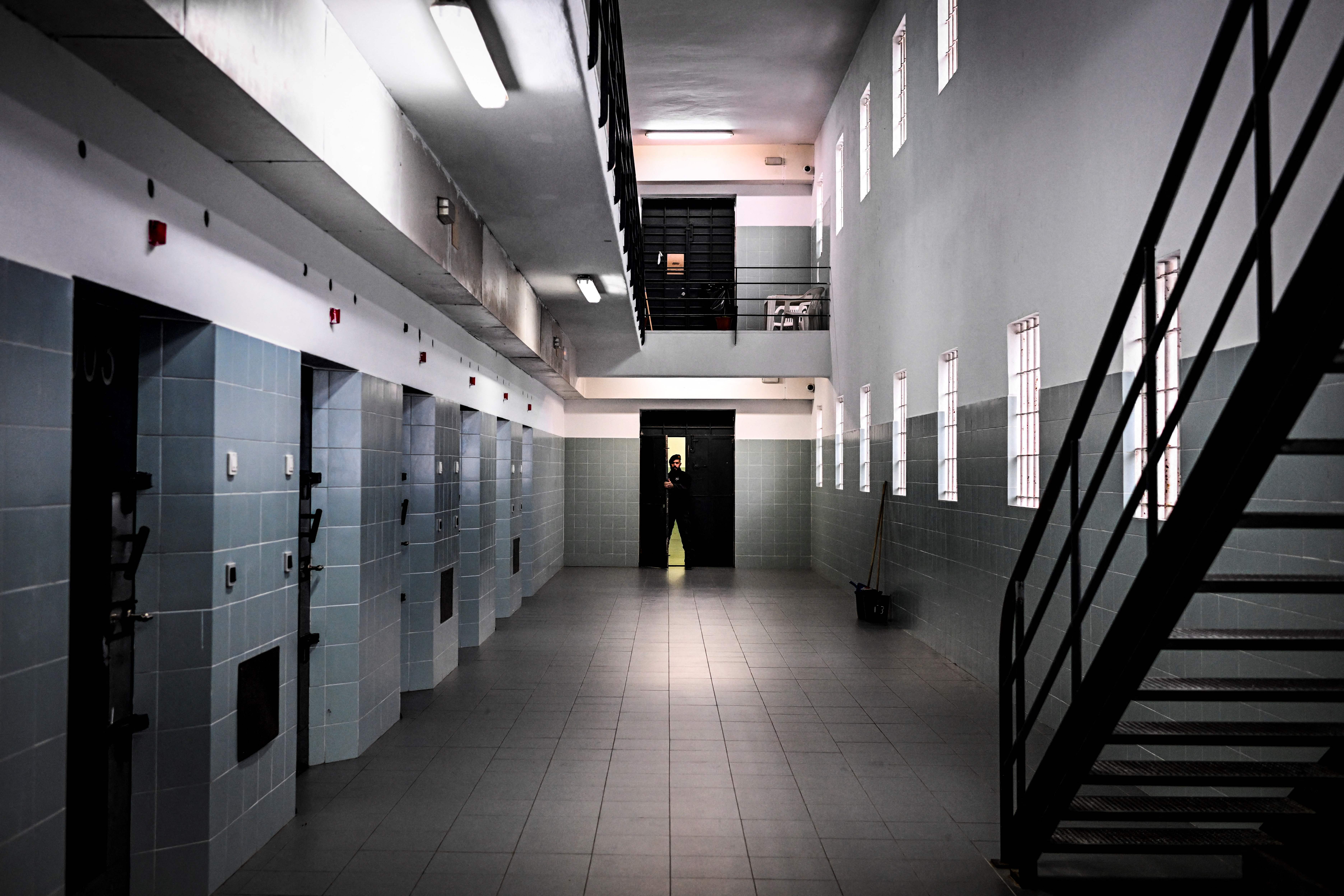 A prison guard stands near the prison cells at Linho prison in Alcabideche, near Cascais on October 31, 2022. - 16 inmates from Linho Prison take part in the project which started in May 2019, developed by Catarina Camara, a 42 years old dancer of Companhia Olga Roriz, trained in Gestalt therapy. (Photo by PATRICIA DE MELO MOREIRA / AFP) (Photo by PATRICIA DE MELO MOREIRA/AFP via Getty Images)