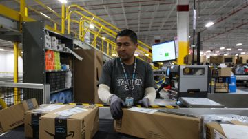 An employee works at an Amazon distribution center in Leon, Guanajuato state, Mexico on March 1, 2023. (Photo by Mario ARMAS / AFP) (Photo by MARIO ARMAS/AFP via Getty Images)