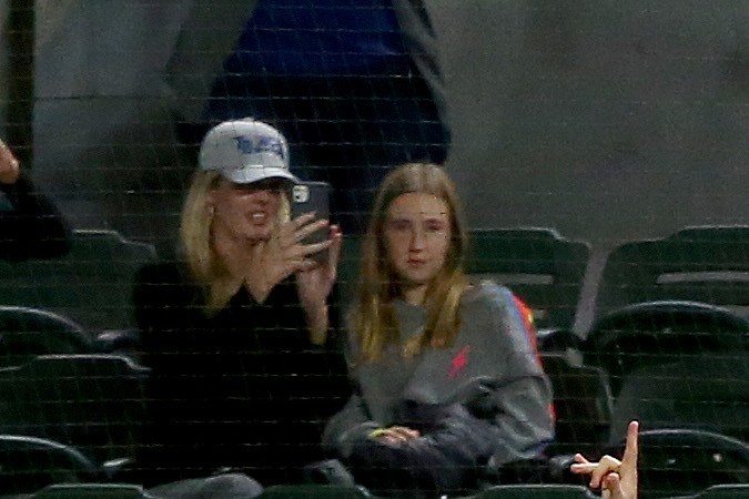 ARLINGTON, TEXAS - OCTOBER 27:  The Los Angeles Dodgers celebrate after Julio Urias #7 strikes out Willy Adames , of the Tampa Bay Rays to give the Dodgers the 3-1 victory in Game Six to win the 2020 MLB World Series at Globe Life Field on October 27, 2020 in Arlington, Texas. (Photo by Tom Pennington/Getty Images)