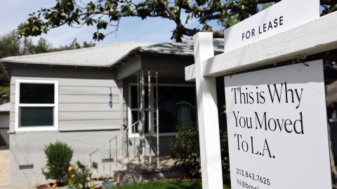 LOS ANGELES, CALIFORNIA - MARCH 15: A "For Lease" sign is posted in front of a house available for rent on March 15, 2022 in Los Angeles, California. Single-family rental home prices are soaring and increased a record 12.6 percent in January compared to the previous year, according to new data from CoreLogic. (Photo by Mario Tama/Getty Images)