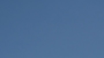 LOS ANGELES, CA - APRIL 28: Residents sell shirts commemorating the Los Angeles riots at the intersection of Florence and Normandie Avenues on April 28, 2012 in Los Angeles, California. This intersection was the location of the beating of truck driver Reginald Denny on April 29, 1992, during the early stages of the Los Angeles riots. It's been 20 years since the Rodney King verdict sparked the infamous Los Angeles riots. (Photo by Kevork Djansezian/Getty Images)