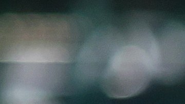 LOS ANGELES, CALIFORNIA - FEBRUARY 08: An Uber rideshare sign is posted nearby as taxis wait to pick up passengers at Los Angeles International Airport (LAX) on February 8, 2023 in Los Angeles, California. Ride-hailing giant Uber has beaten estimates with a strong revenue and adjusted earnings report with quarterly revenue hitting $8.6 billion, 49 percent higher than the same period last year. (Photo by Mario Tama/Getty Images)