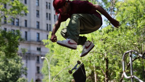 NEW YORK, NEW YORK - MAY 26: Skateboarders ride under the Brooklyn Bridge at the newly opened The Arches—a park under the Manhattan side of the Brooklyn Bridge—that includes a section of the legendary Brooklyn Banks skateboarding spot on May 26, 2023 in New York City. The updated outdoor area includes seating, tables, and courts for pickleball, basketball, and shuffleboard. The skateboard section will expand in the future and is located on a historic skateboarding spot from the 1990s. Pro skateboarder Tony Hawk and his nonprofit organization, The Skatepark Project, provided support for the project. (Photo by Spencer Platt/Getty Images)