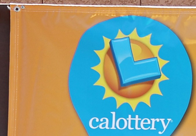 LOS ANGELES, CALIFORNIA - JULY 20: A person walks past Las Palmitas Mini Market (L) on July 20, 2023 in Los Angeles, California. The $1.08 billion winning Powerball ticket was sold at the Las Palmitas Mini Market for the July 19th drawing. The jackpot is the third largest in Powerball history and was picked after three months of drawings without a winner. The mini market is located in the downtown Fashion District close to Skid Row. (Photo by Mario Tama/Getty Images)
