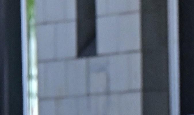 A homeless man pushes his belongings across a street on August 16, 2023 in the Skid Row neighborhood of Los Angeles, California, where homelessness has seen a 10 percent surge compared to last year. A recent report from the Los Angeles Homeless Services Authority reveals an estimate of 42,260 people living on the streets of Los Angeles without shelter, as the homeless population has more than doubled over the past decade. (Photo by Frederic J. BROWN / AFP) (Photo by FREDERIC J. BROWN/AFP via Getty Images)