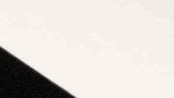 Andrew Martinez, owner of Bo's Bagels, speaks during an interview at his shop on July 12, 2023 in New York. Bagels are as synonymous with New York as pizza and the Statue of Liberty. Although there is no official count of New York's daily bagel production, Sam Silverman, chief executive of the trade group Bagelup, estimates there are about 500 specialty shops across the city's five boroughs. The ring-shaped bread has evolved and been reinvented since its arrival more than a century ago thanks to Polish Jewish immigrants. (Photo by Yuki IWAMURA / AFP) (Photo by YUKI IWAMURA/AFP via Getty Images)