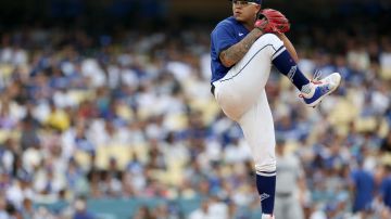LOS ANGELES, CALIFORNIA - AUGUST 19: Julio Urias #7 of the Los Angeles Dodgers pitches against the Miami Marlins during the second inning at Dodger Stadium on August 19, 2023 in Los Angeles, California. (Photo by Harry How/Getty Images)