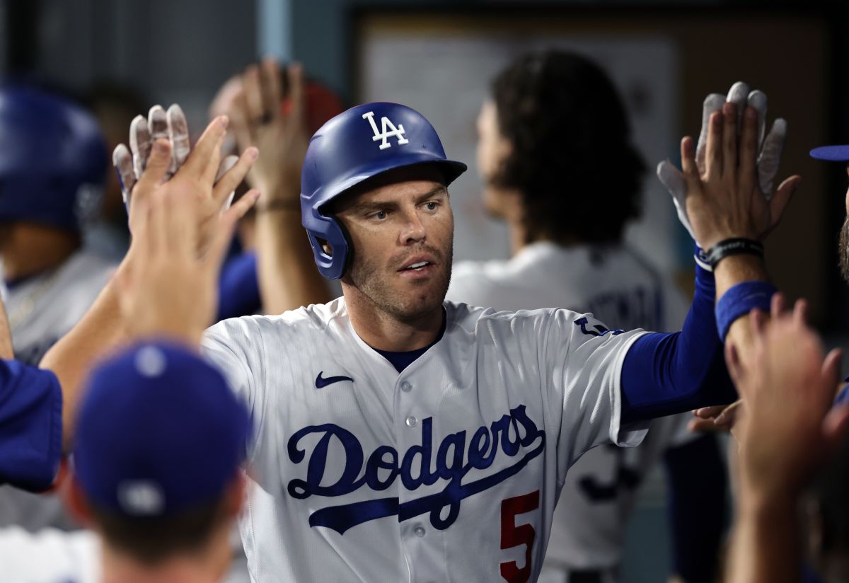 What is the magic number for the Dodgers to qualify for the postseason?