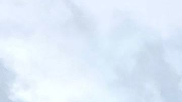 Attendees known as "burners" strike down their Unicorner camp before new rainfalls in a muddy desert plain on September 3, 2023, after heavy rains turned the annual Burning Man festival site in Nevada's Black Rock desert into a mud pit. Tens of thousands of festivalgoers were stranded September 3, in deep mud in the Nevada desert after rain turned the annual Burning Man gathering into a quagmire, with police investigating one death. Video footage showed costume-wearing "burners" struggling across the wet gray-brown site, some using trash bags as makeshift boots, while many vehicles were stuck in the sludge. (Photo by Julie JAMMOT / AFP) (Photo by JULIE JAMMOT/AFP via Getty Images)