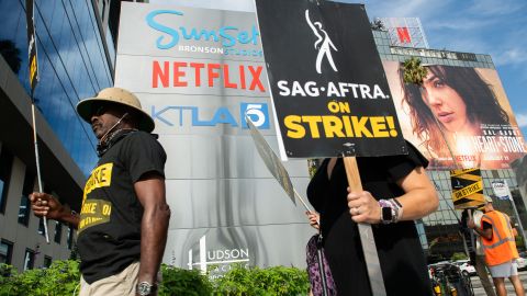 Members of the Screen Actors Guild walk a picket line outside of Netflix in Los Angeles, California, on September 27, 2023. The Writers Guild of America has been on strike since early May and the SAG-AFTRA actors' union joined the writers on the picket lines in July. (Photo by VALERIE MACON / AFP) (Photo by VALERIE MACON/AFP via Getty Images)