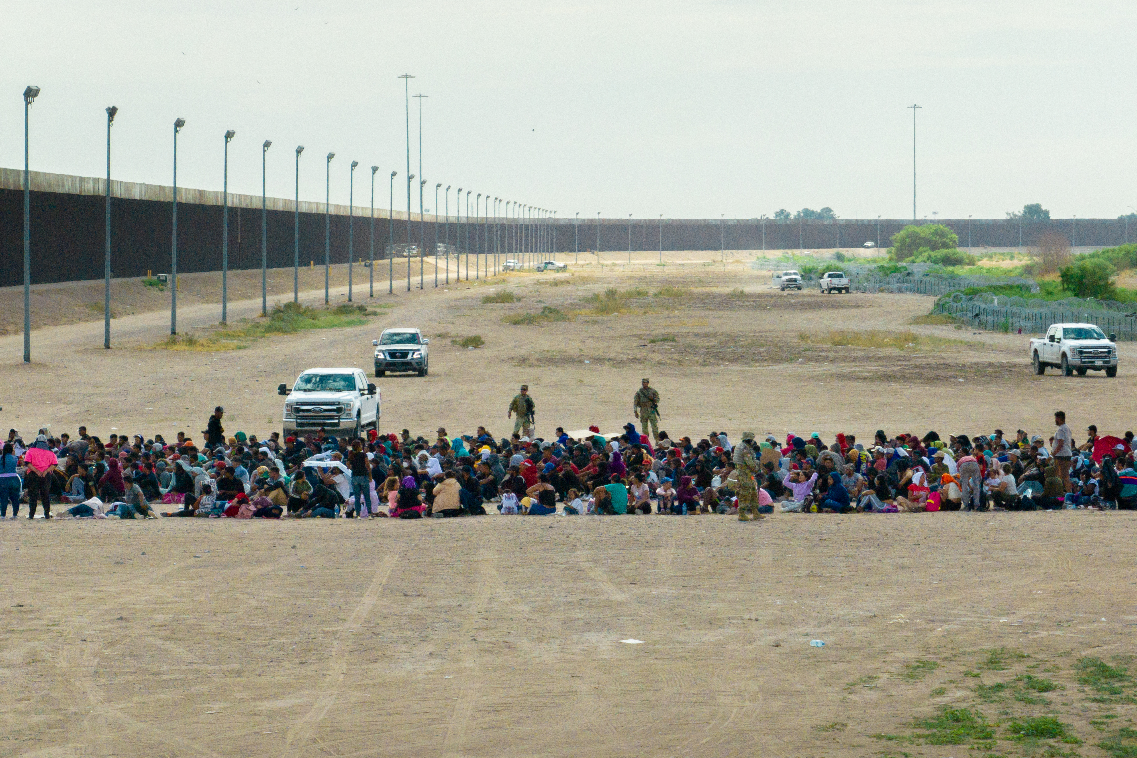 Immigrants wait in Mexico for CBP processing in El Paso, Texas, on September 21, 2023.