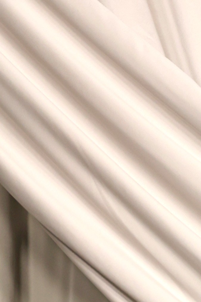 Karol G junto al diseñador Casey Cadwallader en The Business of Fashion 2023.