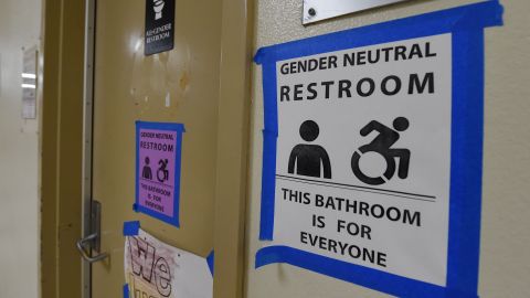 Signs are poseted outside the Santee High School's gender neutral restrooms at their campus in Los Angeles, California on May 4, 2016. There is an "emerging consensus worldwide" that the LGBT community should enjoy the same rights as everyone else, Washington's first envoy for gay rights said, but warned transgender people are still too often victims of violence. / AFP / Mark Ralston (Photo credit should read MARK RALSTON/AFP via Getty Images)