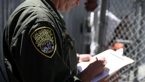 SAN QUENTIN, CA - AUGUST 15: A California Department of Corrections and Rehabilitation (CDCR) officers log condemned inmates who are leaving the exercise yard at San Quentin State Prison's death row on August 15, 2016 in San Quentin, California. San Quentin State Prison opened in 1852 and is California's oldest penitentiary. The facility houses the state's only death row for men that currently has 700 condemned inmates. (Photo by Justin Sullivan/Getty Images)