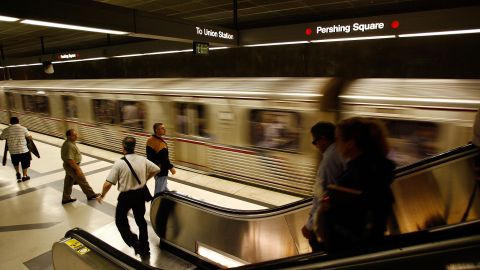 LOS ANGELES, CA - JUNE 3: Passengers wait for Metro Rail subway trains during rush hour June 3, 2008 in Los Angeles, California. Skyrocketing gas prices are driving more commuters to take trains and buses to work instead of their cars. In the first three months of 2008, the number of trips taken on public transport in the US rose 3 percent to 2.6 billion, creating pressures on some transportation systems to cope with increasing ridership. Transit officials in southern California and elsewhere are now encouraging employers to stagger employee schedules to ease the rush hour crunch on trains and buses and Metrolink plans to add 107 rail cars to its fleet of 155 as soon as next year. (Photo by David McNew/Getty Images)